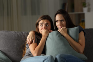 friends hearing spooky noises in their home