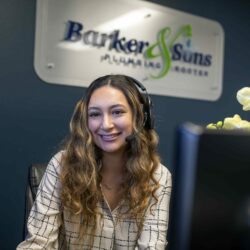 Barker and Sons customer service representative talking with potential clients on the phone