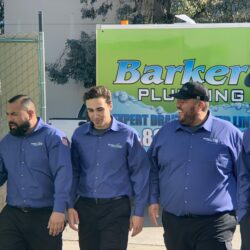 Barker and Sons technicians posing together for a team photo.