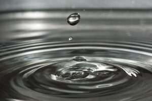 a water droplet falling into a surface
