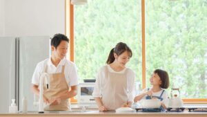 a man and woman in a kitchen